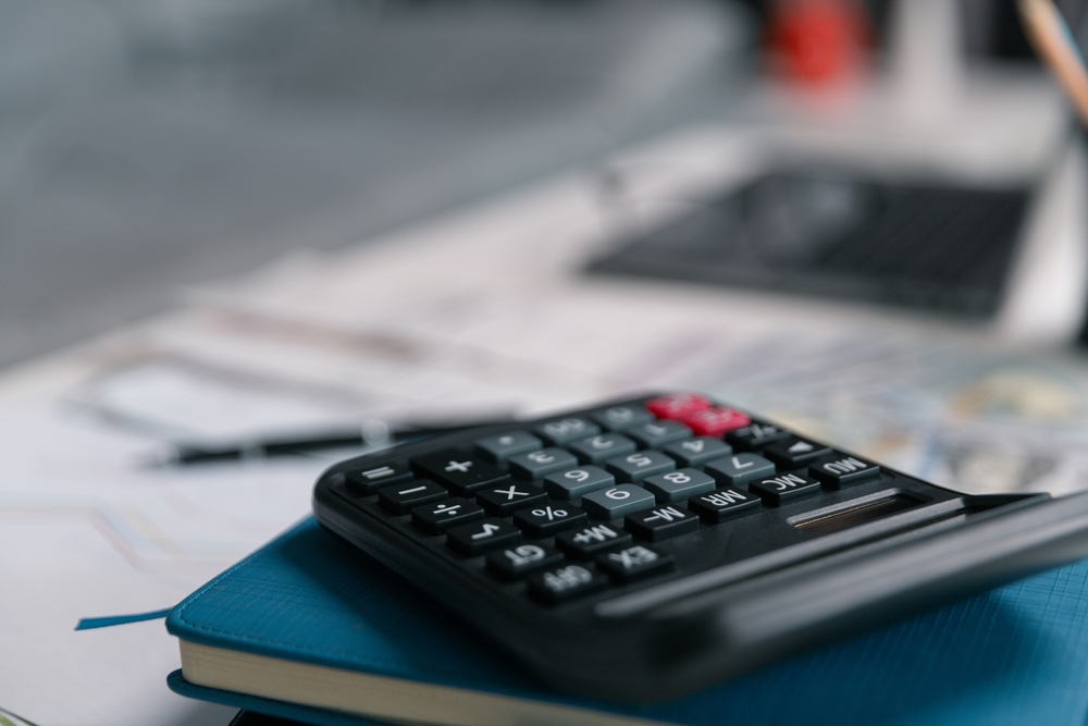 After,Inspecting,Finance,Documents,And,Paperwork,,He,Carefully,Calculated,Each